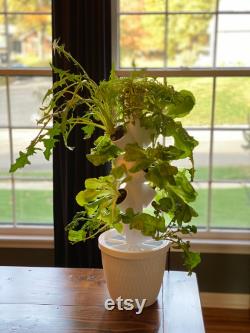 3 8 cup Hydroponic vegetable and herb garden growing tower with log cabin top. Matte Blue with white base. Just add seeds and water