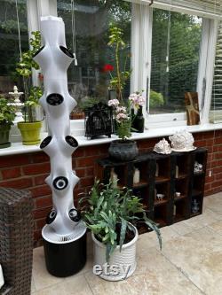 Eco-Friendly Vertical Hydroponics Tower for Indoor Gardening Sustainable, Space-Saving, Self-Watering Planter