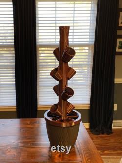 Hydroponic vegetable and herb garden growing tower. Dark Brown with Dark Gray base. Just add seeds and water