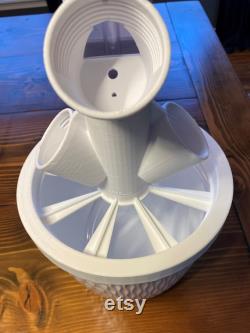 Hydroponic vegetable and herb garden growing tower. White with white base. Just add seeds and water